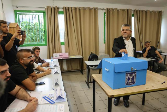Yousef Jabareen, leader of Israel's Arab-led Joint List political alliance, casts his ballot to vote at a polling station in the Arab-Israeli town of Umm al-Fahm on October 27, 2026, on the day of Israel's legislative election. Israelis began voting on October 27 in the first general election since Hamas's October 7, 2023 attack, with voters to deliver their verdict on Prime Minister Benjamin Netanyahu and the country's rightward drift. (Photo by AHMAD GHARABLI / AFP)