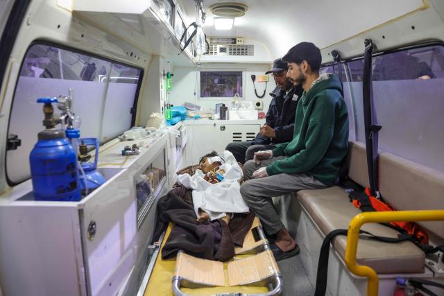EDITORS NOTE: Graphic content / A child is seen inside an ambulace after he was wounded in airstrikes carried out by Jordan on the village of Al-Taf in the Al-Lajat region, located in the northeastern countryside of Daraa, on october 27, 2026. Syrian authorities said at least six people were killed in strikes on October 26 in the country's south, as Jordan said it had targeted "terrorist organisations" after a deadly jihadist attack on a church. In an updated statement, health authorities in Daraa province reported "six martyrs, including three children and a woman", after earlier reporting eight victims. (Photo by Bakr ALkasem / AFP)