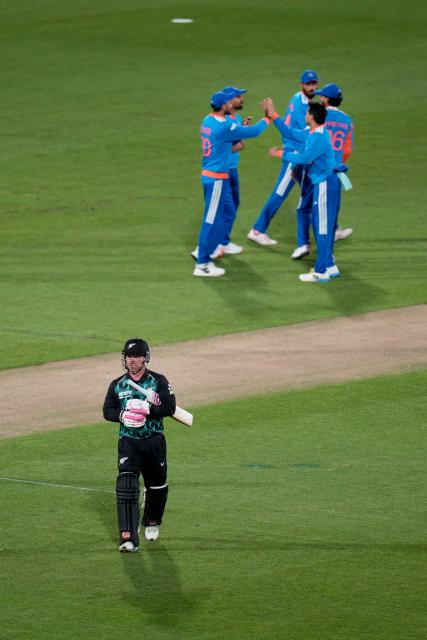 New Zealand Tim Seifert walks from the field after being caught during the 3rd T20 cricket match between New Zealand and India at the HNRY Stadium in Wellington on October 27, 2026. (Photo by Marty MELVILLE / AFP)
