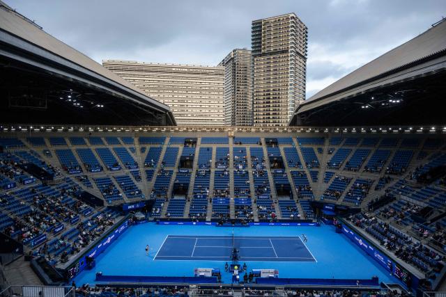 Canada's Leylah Fernandez (R) serves to Japan's Himeno Sakatsume during the WTA Pan Pacific Open tennis tournament at Ariake Coliseum in Tokyo on October 27, 2026. (Photo by Andrew CABALLERO-REYNOLDS / AFP)