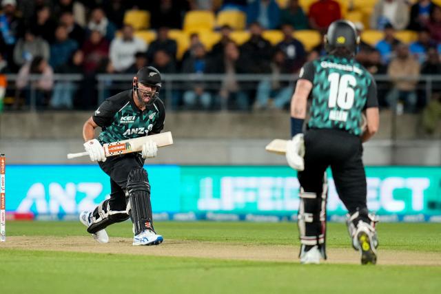 New Zealand Daryl Mitchell (L) calls to teammate Finn Allen (R) during the 3rd T20 cricket match between New Zealand and India at the HNRY Stadium in Wellington on October 27, 2026. (Photo by Marty MELVILLE / AFP)
