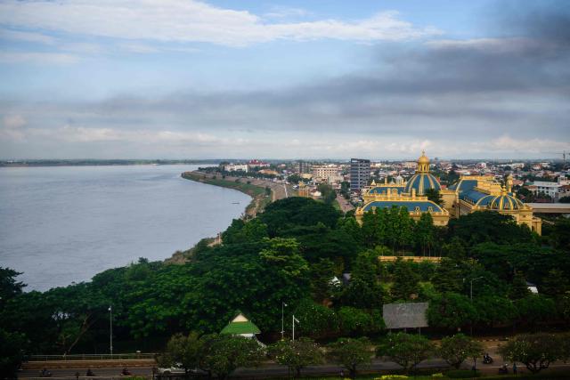 This picture taken on October 21, 2026, shows a general view of buildings near the Mekong River in Pakse, in Laos’ southern Champasak province. (Photo by ANTHONY WALLACE / AFP)