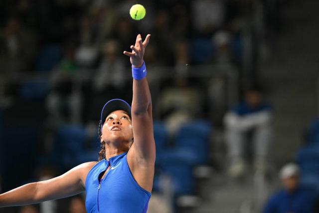 Japan's Naomi Osaka serves to Italy's Jasmine Paolini during the WTA Pan Pacific Open tennis tournament at Ariake Coliseum in Tokyo on October 27, 2026. (Photo by ANDREW CABALLERO-REYNOLDS / AFP)