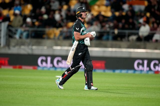 New Zealand's Finn Allen walks from the field after being caught during the 3rd T20 cricket match between New Zealand and India at the HNRY Stadium in Wellington on October 27, 2026. (Photo by Marty MELVILLE / AFP)