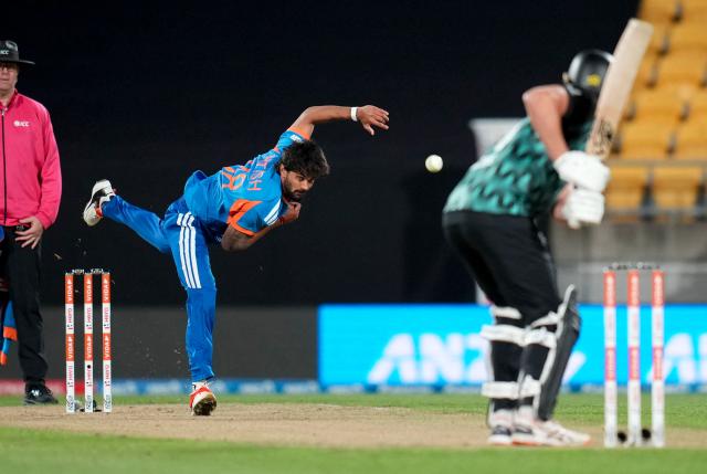 India Nitish Kumar Reddy (C) bowls during the 3rd T20i cricket match between New Zealand and India at the Hnry Stadium in Wellington on October 27, 2026. (Photo by Marty MELVILLE / AFP)