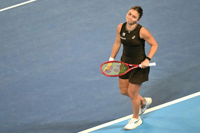 Italy's Jasmine Paolini reacts as she plays against Japan's Naomi Osaka during the WTA Pan Pacific Open tennis tournament at Ariake Coliseum in Tokyo on October 27, 2026. (Photo by ANDREW CABALLERO-REYNOLDS / AFP)