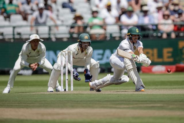 TOPSHOT - South Africa's Marques Ackerman plays a shot on day one of the third Test match between South Africa and Australia at Newlands stadium in Cape Town on October 27, 2026. (Photo by Marco Longari / AFP)