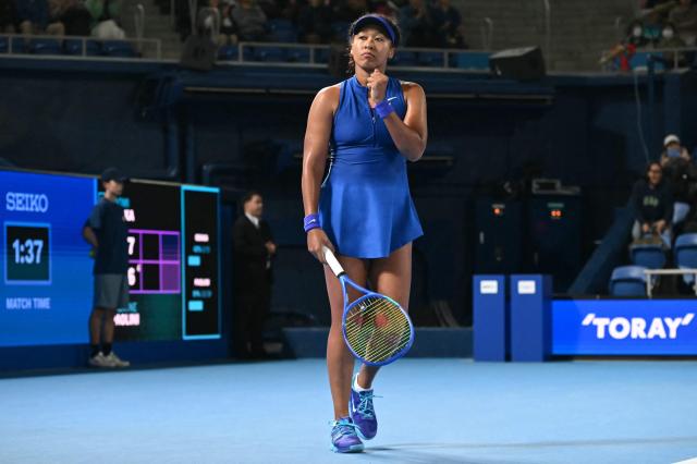 Japan's Naomi Osaka celebrates beating Italy's Jasmine Paolini during the WTA Pan Pacific Open tennis tournament at Ariake Coliseum in Tokyo on October 27, 2026. (Photo by ANDREW CABALLERO-REYNOLDS / AFP)