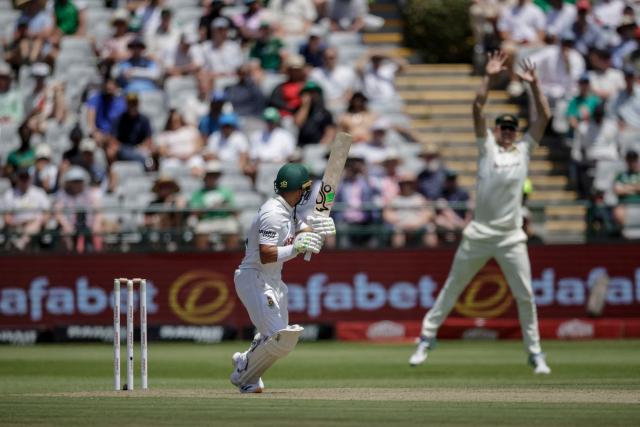 Australia's Cameron Green (R) attempts to catch a ball played by South Africa's Marques Ackerman (L) on day one of the third Test match between South Africa and Australia at Newlands stadium in Cape Town on October 27, 2026. (Photo by Marco Longari / AFP)