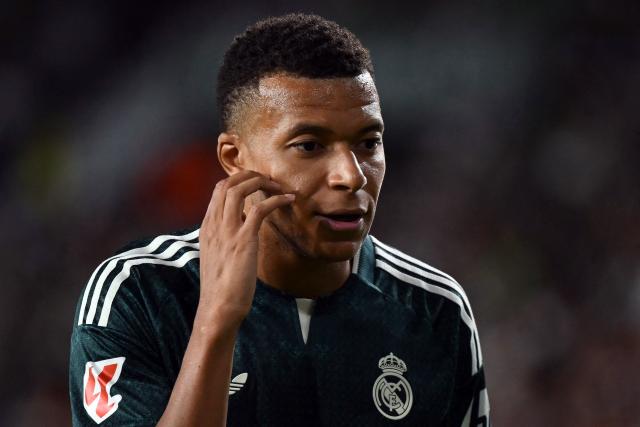 (FILES) Real Madrid's Spanish forward #10 Kylian Mbappe reacts during the Spanish league football match between Elche CF and Real Madrid CF at Martinez Valero Stadium in Elche on September 15, 2026. Kylian Mbappe was dropped on October 27 by two major brands in China after a video circulated online in which the French football star apparently joked about former leader Mao Zedong. (Photo by JOSE JORDAN / AFP)