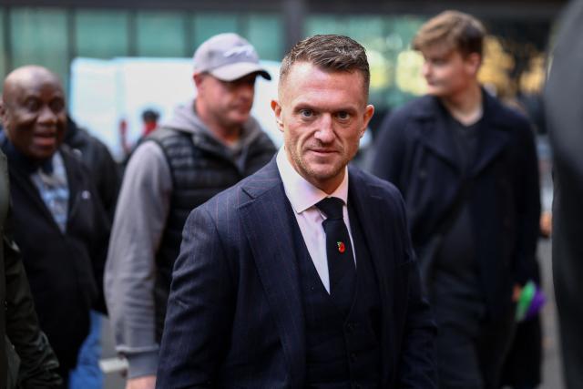 British far-right activist Tommy Robinson, real name Stephen Yaxley-Lennon, arrives at the Southwark Crown Court in London on October 27, 2026. Robinson, who is being tried under his real name, has denied charges of harassing two journalists through his X account between August 5 and 7, 2024. (Photo by Toby Shepheard / AFP)