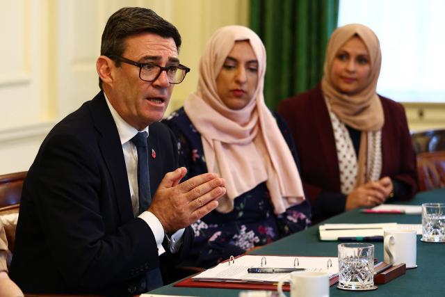 Britain's Prime Minister Andy Burnham (L) hosts Muslim community leaders during a roundtable inside Downing Street in London on October 27, 2026. (Photo by Peter Nicholls / POOL / AFP)