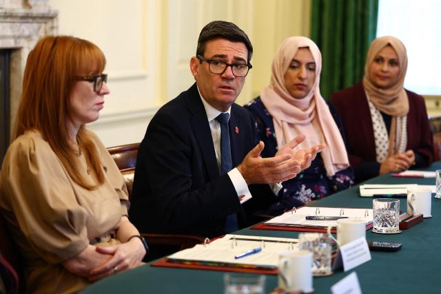 Britain's Prime Minister Andy Burnham (C) and Britain's Housing Secretary Angela Rayner, (L) host Muslim community leaders during a roundtable inside Downing Street in London on October 27, 2026. (Photo by Peter Nicholls / POOL / AFP)