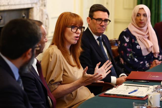 Britain's Prime Minister Andy Burnham (2R) and Britain's Housing Secretary Angela Rayner, (C) host Muslim community leaders during a roundtable inside Downing Street in London on October 27, 2026. (Photo by Peter Nicholls / POOL / AFP)