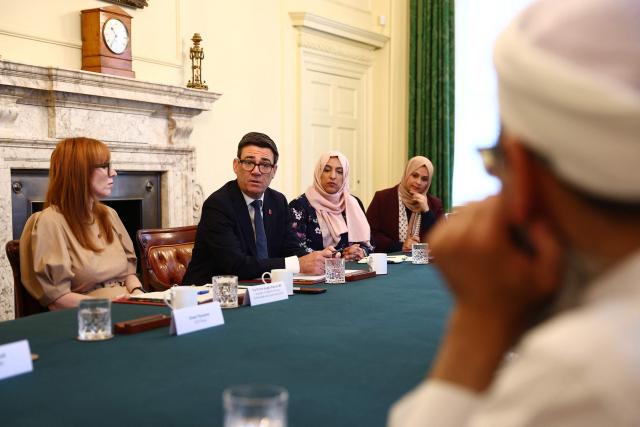 Britain's Prime Minister Andy Burnham (C) and Britain's Housing Secretary Angela Rayner, (L) host Muslim community leaders during a roundtable inside Downing Street in London on October 27, 2026. (Photo by Peter Nicholls / POOL / AFP)