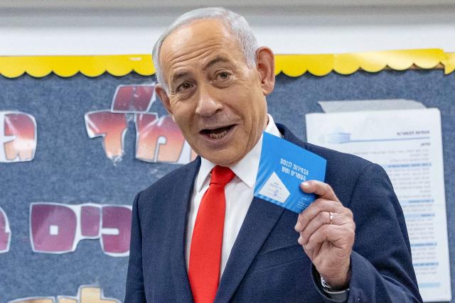 Israel's Prime Minister Benjamin Netanyahu reacts before casting his ballot to vote at a polling station in Jerusalem on October 27, 2026, on the day of Israel's legislative election. Netanyahu called on Israelis to vote "the right way" on October 27 as he cast his ballot in Jerusalem, facing a close-fought race in a pivotal general election. Israelis are flocking to the polls for the first time since Hamas's October 7, 2023 attack, with a deeply divided electorate delivering their verdict on the veteran leader. (Photo by Yonatan Sindel / POOL / AFP)