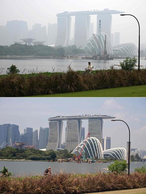 (COMBO) A combination image created on October 27, 2026, shows a cyclist riding along Marina Bay east garden as the city skyline is shrouded with haze in Singapore on September 28, 2026 (top), and the same buildings seen through clear skies as haze conditions improve in Singapore on October 27, 2026 (bottom). The haze has sent air pollution levels surging to dangerous levels not only in Indonesia, but also in Malaysia, Singapore and East Timor, prompting the ASEAN regional bloc to call a meeting over the crisis. (Photo by Roslan RAHMAN / AFP)