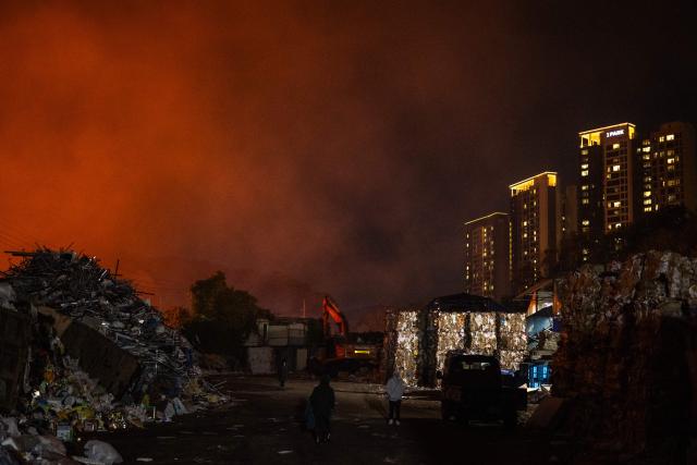 Smoke rises at the scene of a fire in the shanty village of Guryong on the outskirts of Gangnam district in Seoul on October 27, 2026. (Photo by Philip FONG / AFP)