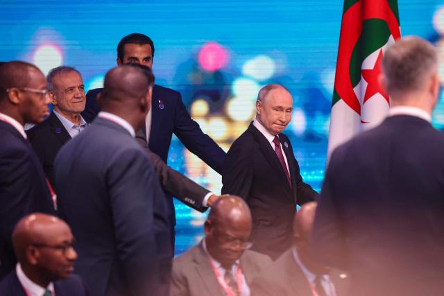 Russian President Vladimir Putin and Iranian President Masoud Pezeshkian attend the 8th Gas Exporting Countries Forum (GECF) summit at the World Trade Center in Moscow on October 27, 2026. (Photo by MAXIM SHIPENKOV / POOL / AFP)