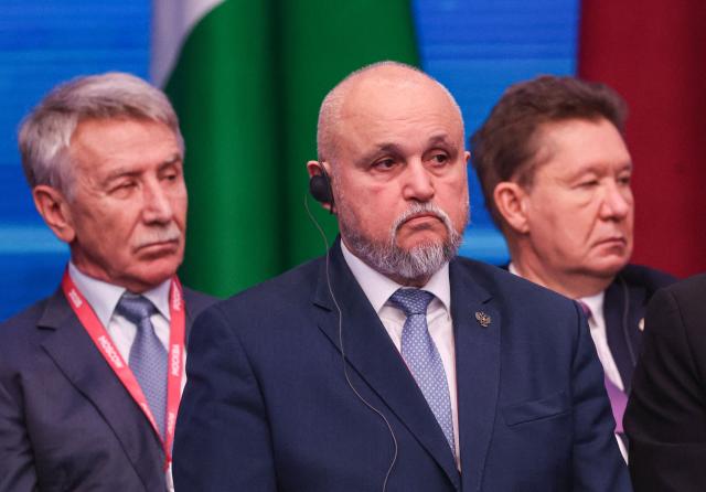 Leonid Mikhelson, CEO of Russia's gas company Novatek, Russian Energy Minister Sergei Tsivilev and Gazprom CEO Alexey Miller attend the 8th Gas Exporting Countries Forum (GECF) summit at the World Trade Center in Moscow on October 27, 2026. (Photo by MAXIM SHIPENKOV / POOL / AFP)