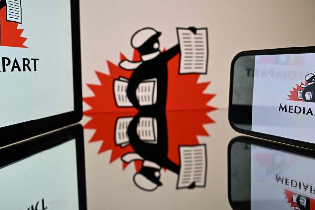 This photograph shows the logo of French online news site Mediapart displayed on screens in Toulouse, southwestern France on October 27, 2026. (Photo by Lionel BONAVENTURE / AFP)