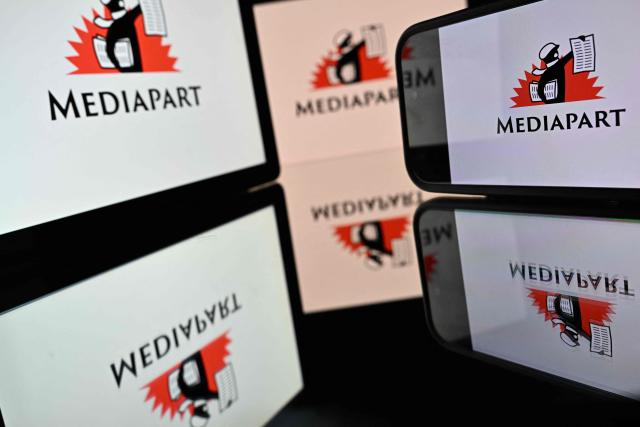 This photograph shows the logo of French online news site Mediapart displayed on screens in Toulouse, southwestern France on October 27, 2026. (Photo by Lionel BONAVENTURE / AFP)