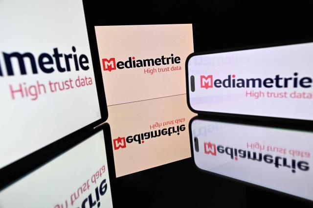 This photograph shows the logo of Mediametrie, French audience measurement company, displayed on screens in Toulouse, southwestern France on October 27, 2026. (Photo by Lionel BONAVENTURE / AFP)