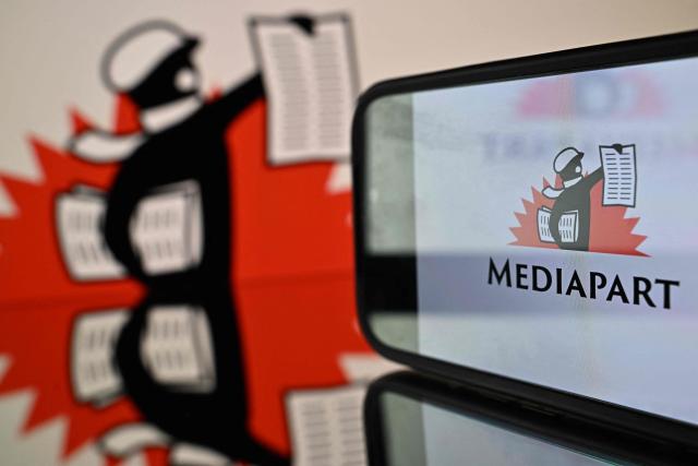 This photograph shows the logo of French online news site Mediapart displayed on screens in Toulouse, southwestern France on October 27, 2026. (Photo by Lionel BONAVENTURE / AFP)
