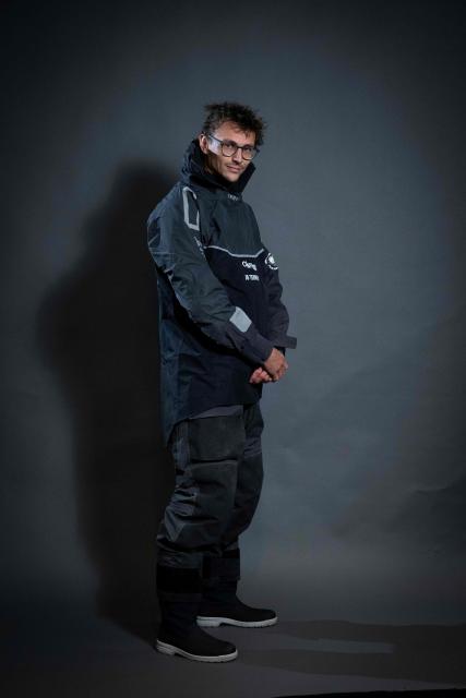"Mic Odyssey" Class40 French sailor Jean-Baptiste Ternon poses for a photo session in Saint-Malo, western France a few days before the start of the 13th Route du Rhum - Destination Guadeloupe in Saint-Malo, western France, on October 27, 2026. From Saint-Malo in Brittany to Pointe-a-Pitre in Guadeloupe, 115 skippers across 6 classes will take the start on November 1, 2026, in this solo transatlantic sailing race. (Photo by Martin BUREAU / AFP)