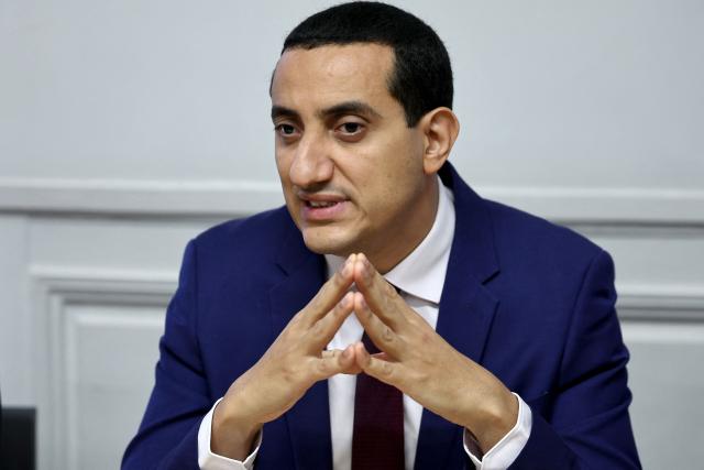 Trappes' mayor Ali Rabeh holds a press conference at the National Assembly, France's Parliament lower house, in Paris on October 27, 2026, four days after a gunman firing from a car killed one person and wounded five, including a 12-year-old girl shot eight times, in the Paris suburban cities of Trappes and La Verriere, in what French president branded a "racist terrorist attack". (Photo by SIMON WOHLFAHRT / AFP)