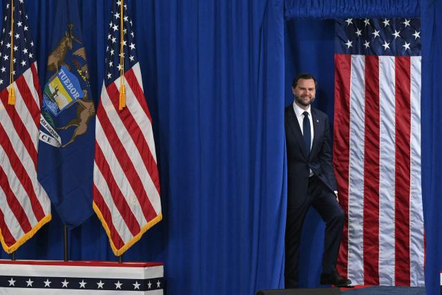 US Vice President JD Vance arrives to speak at a midterm campaign rally at CHI Aviation in Howell, Michigan on October 27, 2026. Vance is speaking in support of Rodgers who is running against Democratic candidate Abdul El-Sayed for the Michigan senate seat. (Photo by SAUL LOEB / POOL / AFP)