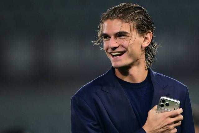 Como’s Argentine midfielder #10 Nicolas Paz smiles prior the Italian Serie A football match between Torino FC and Como 1907 at the Olympic Stadium Grande Torino in Turin, northern Italy on October 27, 2026. (Photo by Marco Bertorello / AFP)