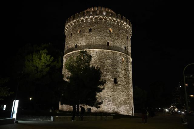 This photograph shows the White Tower illuminated by a new lighting system in Thessaloniki on October 27, 2026. (Photo by Sakis Mitrolidis / AFP)