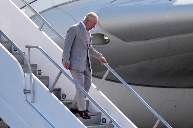 Britain's King Charles III disembarks from his plane at Lynden Pindling International Airport in Nassau, Bahamas on October 27, 2026. King Charles III is arriving to begin a weeks long tour of The Bahamas, Guyana and Antigua & Barbuda. (Photo by Aaron Chown / POOL / AFP)