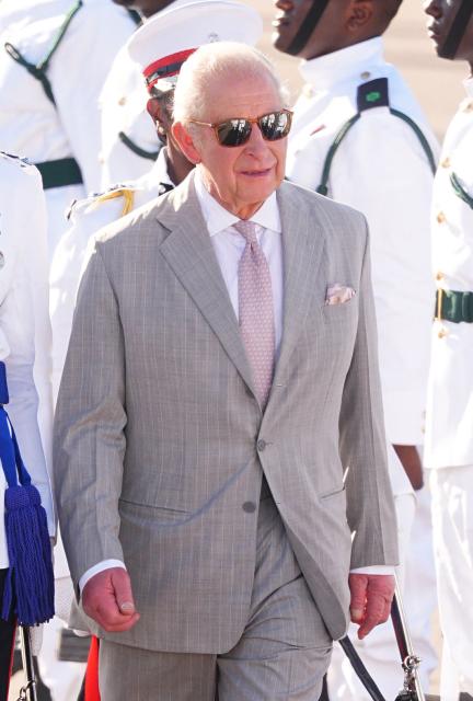 Britain's King Charles III arrives at Lynden Pindling International Airport in Nassau, Bahamas on October 27, 2026. King Charles III is arriving to begin a weeks long tour of The Bahamas, Guyana and Antigua & Barbuda. (Photo by Aaron Chown / POOL / AFP)