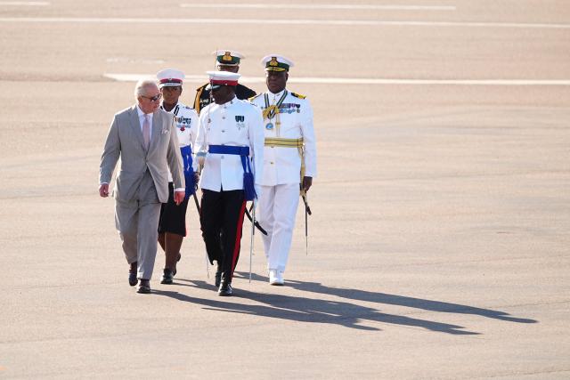 Britain's King Charles III arrives at Lynden Pindling International Airport in Nassau, Bahamas on October 27, 2026. King Charles III is arriving to begin a weeks long tour of The Bahamas, Guyana and Antigua & Barbuda. (Photo by Aaron Chown / POOL / AFP)