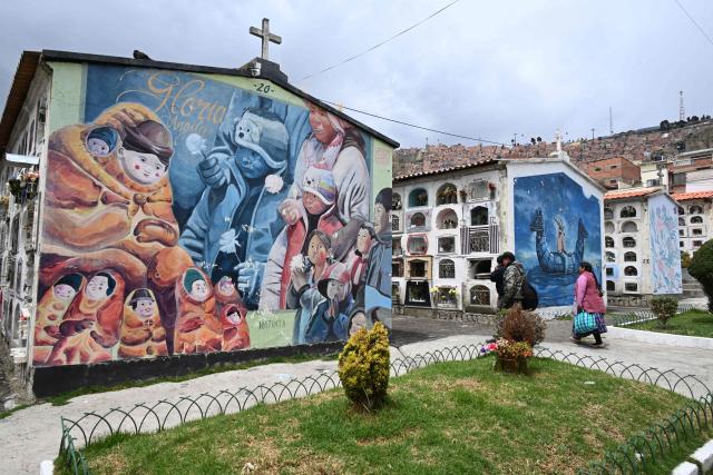 People visit the General Cemetery in La Paz on October 27, 2026, ahead of All Saints' Day celebrations. (Photo by Aizar RALDES / AFP)