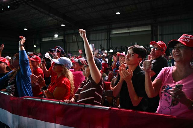 Supporters cheer as US President Donald Trump speaks at a midterm campaign rally at Port of Corpus Christi in Corpus Christi, Texas on October 27, 2026. (Photo by Kent NISHIMURA / AFP)