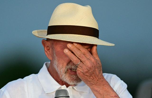 Brazil's President Luiz Inacio Lula da Silva cries during his birthday celebrations at the Alvorada Palace, the official presidential residence, in Brasilia on October 27, 2026. Lula da Silva turned 81 on October 27, 2026, promised to work "24 hours a day" following his historic re-election for a fourth term. (Photo by Pablo PORCIUNCULA / AFP)