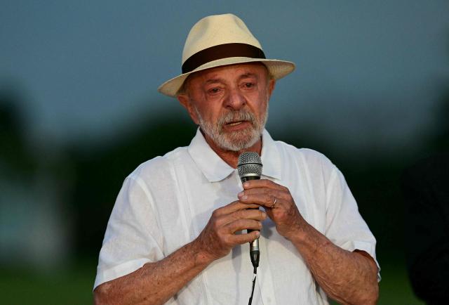 Brazil's President Luiz Inacio Lula da Silva speaks during his birthday celebrations at the Alvorada Palace, the official presidential residence, in Brasilia on October 27, 2026. Lula da Silva turned 81 on October 27, 2026, promised to work "24 hours a day" following his historic re-election for a fourth term. (Photo by Pablo PORCIUNCULA / AFP)