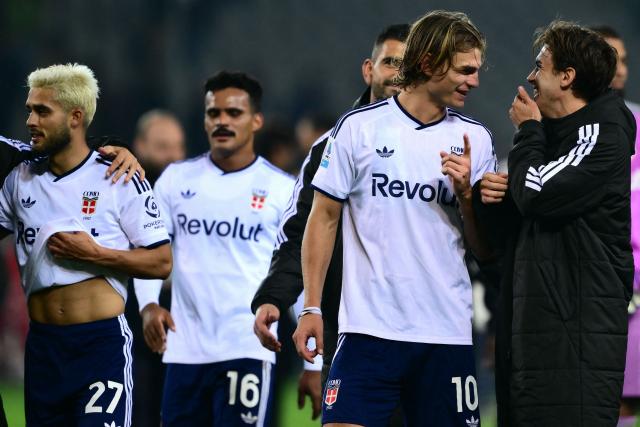 Como’s Argentine midfielder #10 Nicolas Paz (2R) celebrates the victory with Como’s Spanish midfielder #6 Luis Milla (R) at the end of the Italian Serie A football match between Torino FC and Como 1907 at the Olympic Stadium Grande Torino in Turin, northern Italy on October 27, 2026. (Photo by Marco Bertorello / AFP)