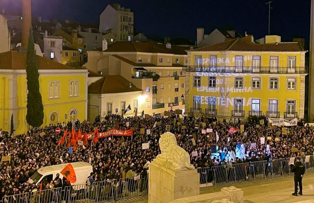 People gather in front of the Portuguese Parliament during a protest against the housing shortage, soaring rents and low wages in Lisbon, on October 27, 2026. The protesters have accused the government of failing to act to tackle Portugal's housing crisis and trying to push through rent reforms to make eviction easier. The Portuguese demonstrators have followed the lead of protesters in neighbouring Spain, where tents have been set up in central Madrid for weeks. (Photo by Jérome PIN / AFP)