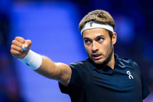 Italy's Flavio Cobolli reacts during his match against Bulgaria's Grigor Dimitrov (not in picture) during the Erste Bank Open 2026 ATP 500 tennis tournament in Vienna, Austria, on October 27, 2026. (Photo by MAX SLOVENCIK / APA / AFP) / Austria OUT