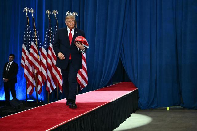 US President Donald Trump arrives to the stage for a midterm campaign rally at Lubbock Memorial Civic Center in Lubbock, Texas on October 27, 2026. (Photo by Kent NISHIMURA / AFP)