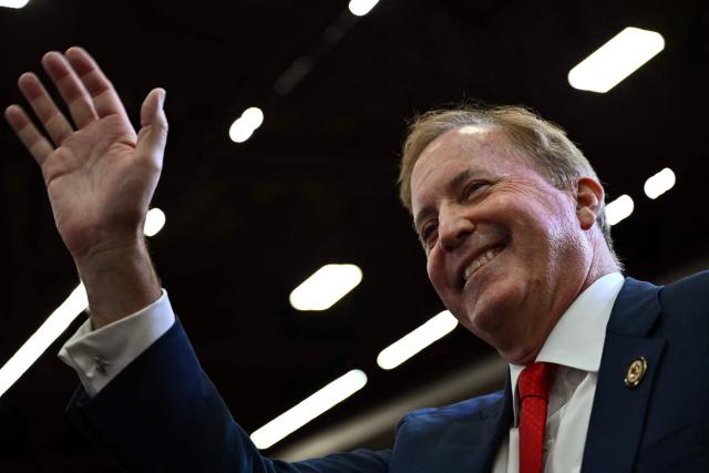 Texas Attorney General and Republican candidate for the US Senate Ken Paxton waves during a campaign rally with US President Donald Trump at Lubbock Memorial Civic Center in Lubbock, Texas on October 27, 2026. (Photo by Kent NISHIMURA / AFP)