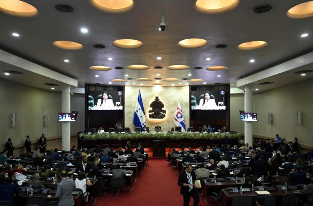 General view of the Honduras' National Congress during the announcement of a reforms package to the Criminal Code and the Code of Criminal Procedure aimed at strengthening the fight against gangs and criminal groups in Tegucigalpa on October 27, 2026. (Photo by Orlando SIERRA / AFP)
