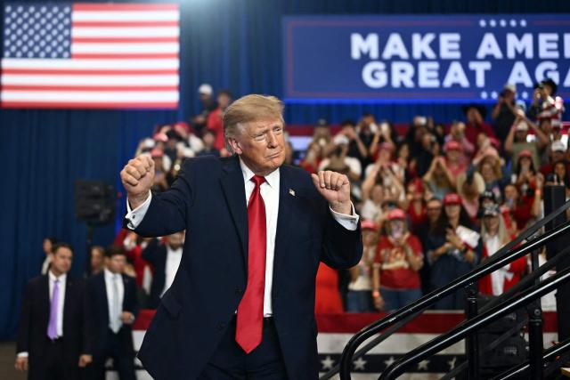 US President Donald Trump dances after speaking during a midterm campaign rally at Lubbock Memorial Civic Center in Lubbock, Texas on October 27, 2026. (Photo by Kent NISHIMURA / AFP)