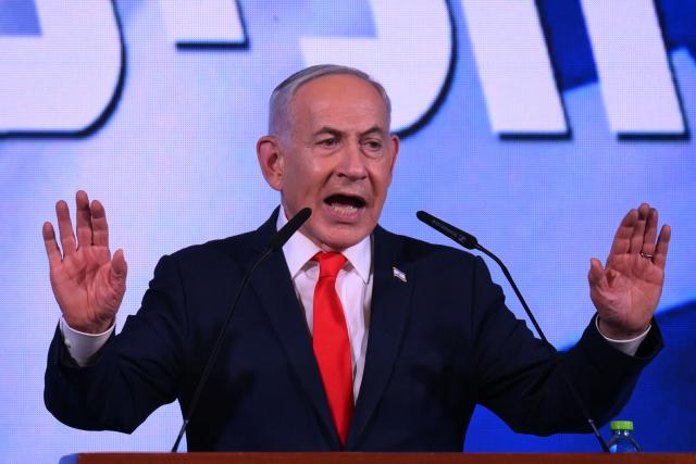 Israel's Prime Minister Benjamin Netanyahu addresses his supporters at the election night rally after the first exit polls were announced, in Jerusalem on early October 28, 2026, during Israel's legislative elections. Israeli voters on October 27 gave a narrow edge to opposition parties over Netanyahu, initial projections showed, after decades-high turnout in the country's first election since the trauma of the October 7, 2023 attacks. (Photo by Jewel SAMAD / AFP)