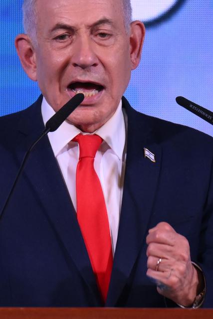 Israel's Prime Minister Benjamin Netanyahu addresses his supporters at the election night rally after the first exit polls were announced, in Jerusalem on early October 28, 2026, during Israel's legislative elections. Netanyahu vowed early on October 28 to form a new government after a close election, saying no leader should rule through the backing of Israeli Arabs, whose parties posted strong gains. (Photo by Jewel SAMAD / AFP)
