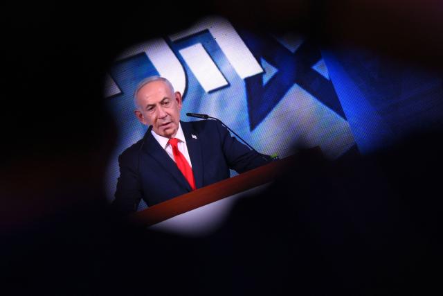 Israel's Prime Minister Benjamin Netanyahu addresses his supporters at the election night rally after the first exit polls were announced, in Jerusalem on early October 28, 2026, during Israel's legislative elections. Netanyahu vowed early on October 28 to form a new government after a close election, saying no leader should rule through the backing of Israeli Arabs, whose parties posted strong gains. (Photo by Jewel SAMAD / AFP)